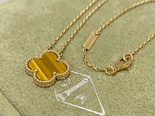 Van Cleef & Arpels Vintage Alhambra pendant, 18k yellow gold, Tiger Eye