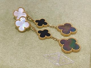 Van Cleef & Arpels Magic Alhambra earrings, 3 Motifs, 18k yellow gold, Mother-of-pearl, Onyx.