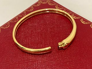 Cartier Panthere de Cartier bracelet Yellow Gold onyx, set with 2 tsavorite garnets size 17
