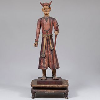 Polychromed Indonesian Figure and a Stand