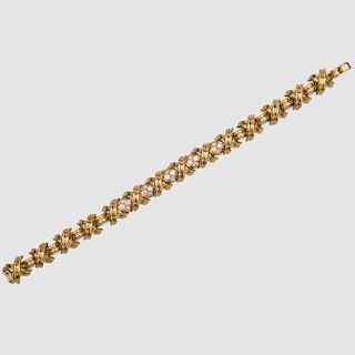 TIFFANY & CO. 18K Yellow Gold and Diamond "Signature X" Bracelet