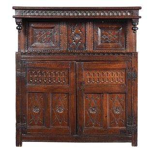 An Early British Charles II Carved Oak Court Cupboard