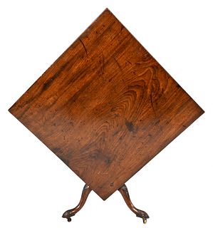 A Chippendale Carved and Figured Mahogany Tilt Top Breakfast Table