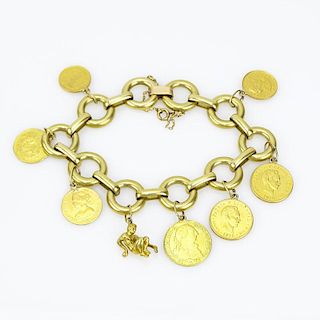 Vintage 18 Karat Yellow Gold Charm Bracelet with Seven Gold Coins Including Cuban, Mexican, Peruvian and Spanish Coins and a 
