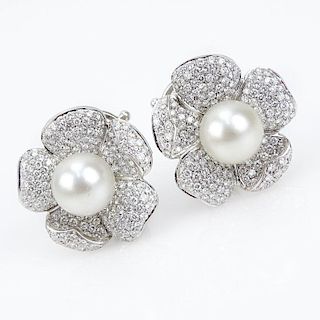 7.50 Carat Pave Set Diamond, South Sea Pearl and 18 Karat White Gold Flower Earrings.