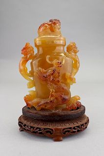 Twin Handled Chinese Carved Amber Vase on Stand