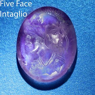 A SCARCE ROMAN CARVED AMETHYST, FIVE FACED INTAGLIO FORMING BUST OF ATHENA. 
Presumed to be 2ND CENTURY B.C. 
