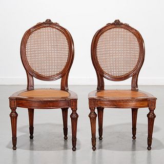 Pair Continental Neoclassic walnut chairs, 18th c.