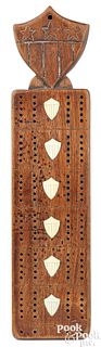 Sailor's carved mahogany cribbage board, 19th c.