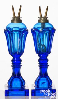 Pair of sapphire cobalt glass loop whale oil lamps