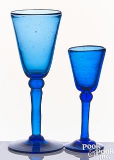 Two blown cobalt glass stemmed wine glasses