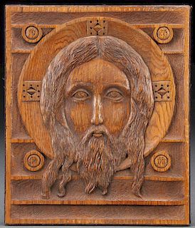 A CARVED RELIEF OAK ICON OF THE HOLY FACE
