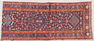 FOUR TURKISH AND CAUCASIAN ORIENTAL RUGS