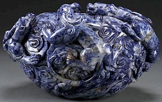A CHINESE CARVED HARDSTONE DRAGONS COUPE