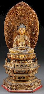 A JAPANESE CARVED AND GILT LACQUER BUDDHA, MEIJI