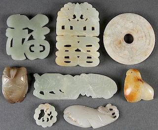 A GROUP OF EIGHT CHINESE CARVED JADE ORNAMENTS