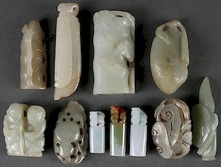 A GROUP OF ELEVEN CHINESE CARVED JADE ORNAMENTS