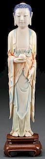 A FINE CHINESE CARVED IVORY AND POLYCHROME FIGURE