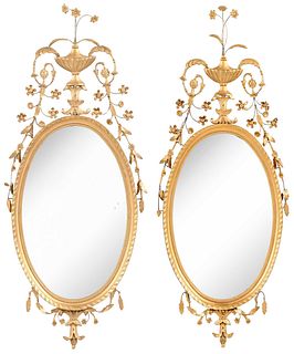A Pair of Williamsburg Restoration George III Style Gilt Oval Mirrors