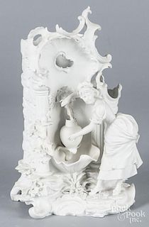 Bisque spill vase, late 19th c., woman at lavabo