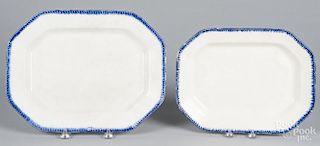 Two pearlware blue feather edge platters, 19th c., 12'' l., 15 3/4'' w. and 10 3/8'' l., 13 1/2'' w.