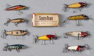 Nine South Bend wood fishing lures, to include five Nip-I-Diddee, one with the original box, two inj