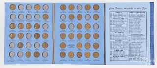 Complete set of Roosevelt dimes, 1946-1964, together with four partial Lincoln cent collectors books