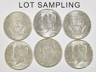 Forty-four silver half dollars, mostly Kennedy.