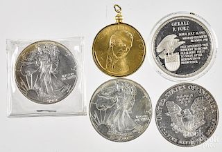 Two Gerald Ford medals, to include a gold plated medal and a silver medal, together with three 1 oz.