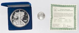 Half pound .999 silver round, together with an 1986 American silver eagle.
