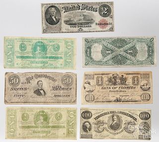 Assorted US currency, to include a one dollar 1917 note and a two dollar 1917 note, three 1928 silve
