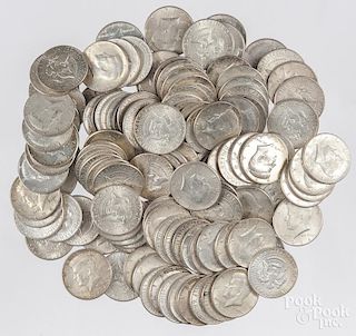 One hundred and thirty-four Kennedy silver half dollars, 1964.