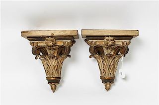 * A Pair of Parcel Gilt Wall Brackets Height 10 inches.