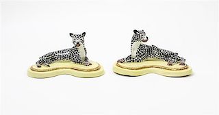 * A Pair of Porcelain Models of Recumbent Cheetahs Width 7 3/4 inches.