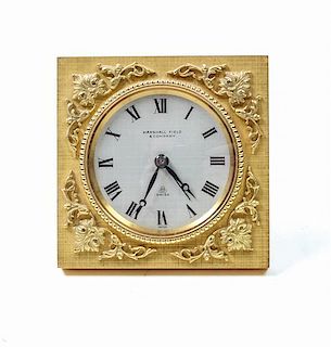 * A Swiss Gilt Bronze Table Clock Height 2 7/8 inches.