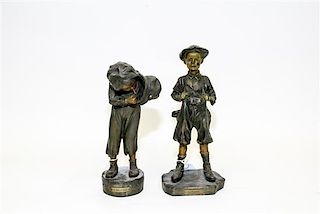 A Pair of Cast Metal Bronzes Height of tallest 13 inches.