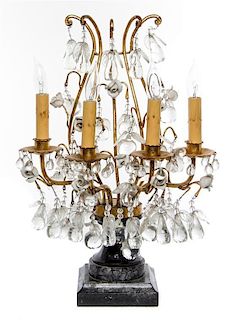 * An Italian Tole, Porcelain and Glass Four-Light Candelabra Height 21 inches.