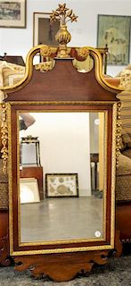 * A George II Style Parcel Gilt Mahogany Mirror Height 47 x width 21 1/2 inches.