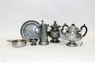 * A Collection of Five Pewter Serving Articles Width of first 12 inches.