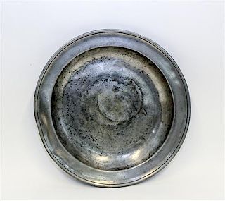 * An American Pewter Charger Diameter 13 1/8 inches.