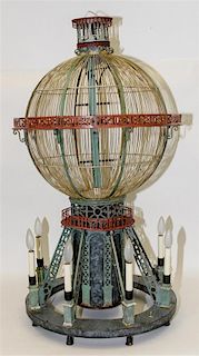 A Birdcage Form Chandelier. Height 42 inches.