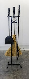 A Cast Iron Fireplace Tool Set Height 34 3/4 inches.