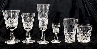 A Partial Set of Waterford Glassware Height of first 6 3/4 inches.