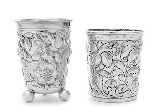 * A Portuguese Silver Cup, 20th Century, of footed form with floral decoration; together with a silvered metal beaker with si