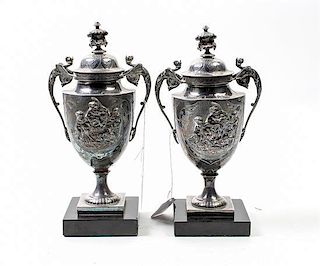 * A Pair of Neoclassical Silver-Plate Urns Height of urns 9 3/4 inches.