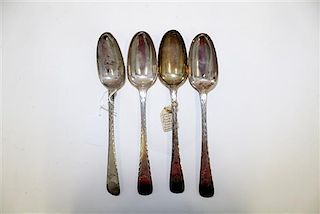 A Set of Four Silver Table Spoons, Makers mark V&C, late 19th century, the handles with bright-cut geometric decoration.