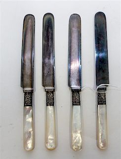 A Set of Twelve Silver-Plate and Mother of Pearl Dinner Knives, , each with a mother of pearl handle, the ferrule decorated w