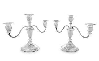 A Pair of American Silver Three-Light Candelabra, Mueck-Carey Co., New York, NY, the central urn form cup issuing two reed de