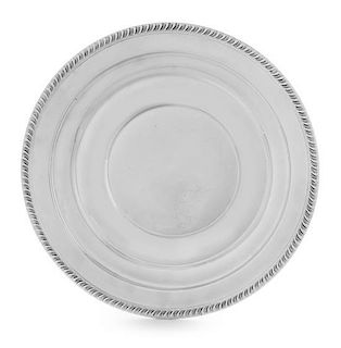 An American Silver Dish, , having a gadrooned rim and a stepped border.