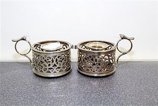 A Pair of English Silver-Plate Chamber Sticks, Likely Barker Bros., Birmingham, each having a central candle enclosed within 